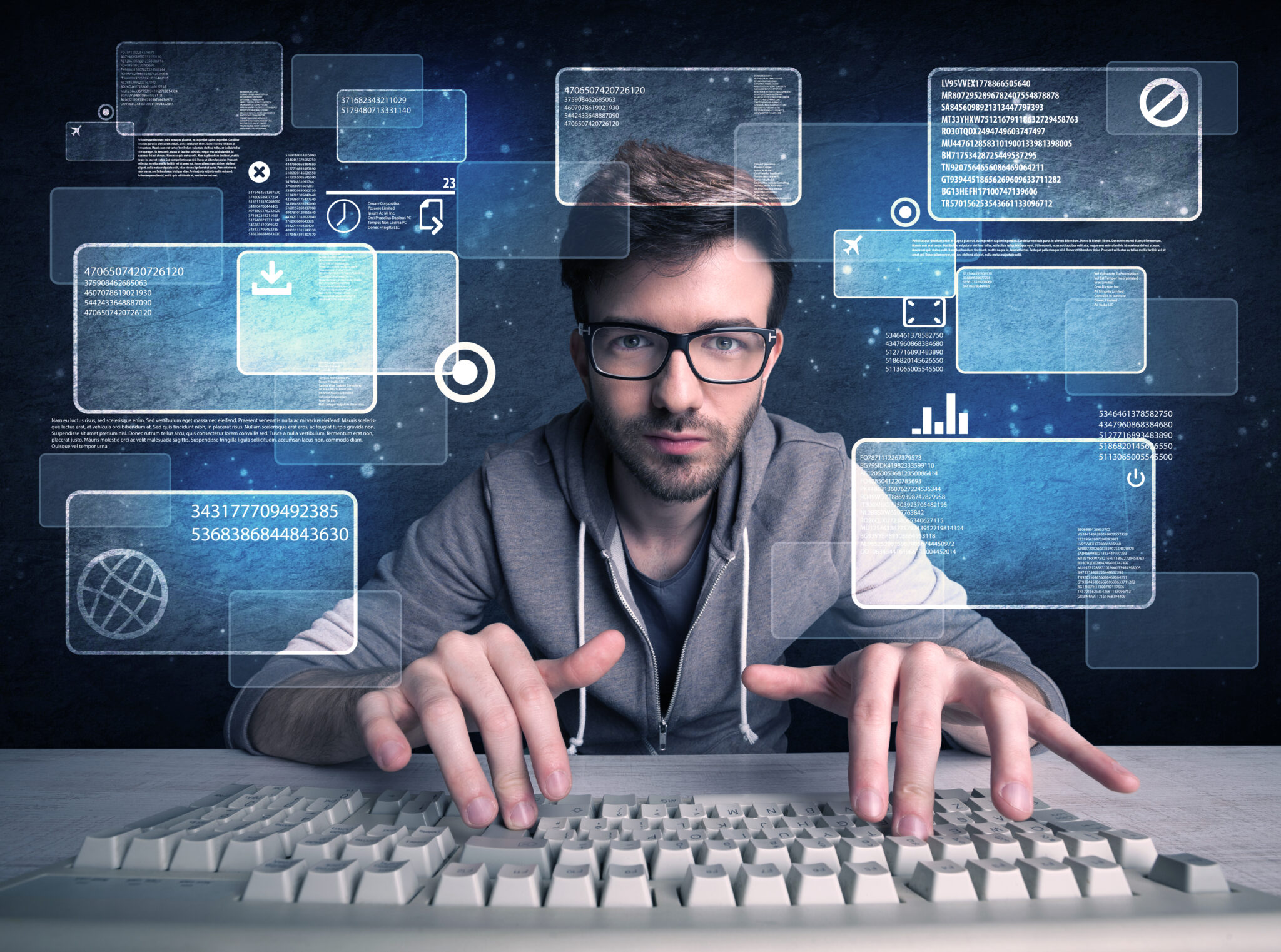 Nerd with glasses hacking websites